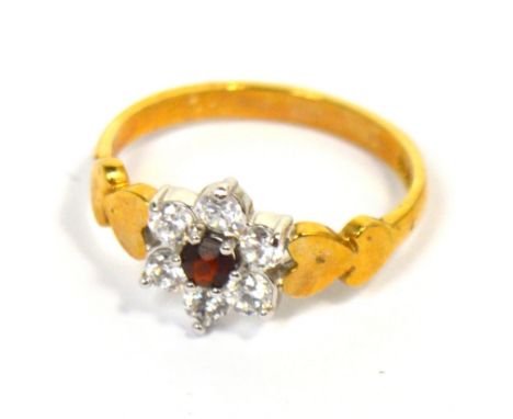 A 9ct yellow gold floral set dress ring, size L, approx 1.8g.