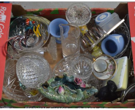 A quantity of decorative glassware and ceramics to include glass bowls, a Caithness paperweight, a pair of glass candlesticks