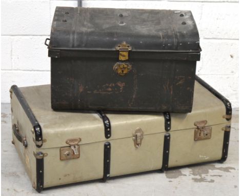 An ebonised metal trunk, width 60cm and a larger paper-lined trunk (2).