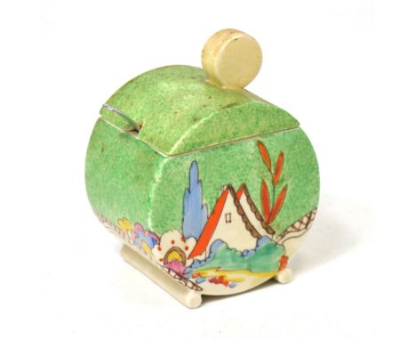A Clarice Cliff green ground 'Bonjour' orange roof pattern preserve pot, height 11cm, with associated spoon.