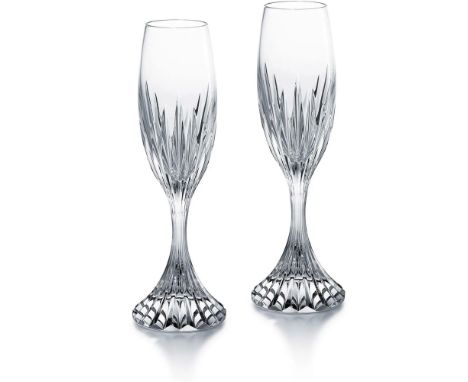 Includes 2 crystal champagne flutes from the Massena collection, featuring deep cuts that radiate elegance and amplify light 