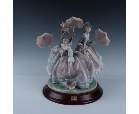 Limited edition. Features three women in beautiful and intricate Rococo-style dresses. Signed on base, J. Puche, J. Navarro. 