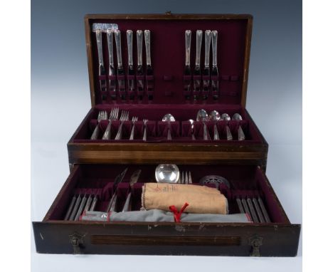 Amazing collection of silverplated utensils with a patterned border on the handle that consists of 10 table knives 9.25"L, 10