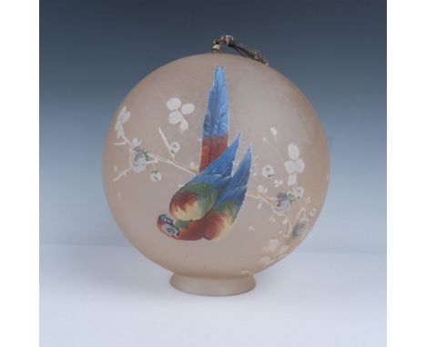 Hanging hand painted globe light fixture that depicts a scarlet macaw or a parrot on a branch. Issued: 20th centuryDimensions