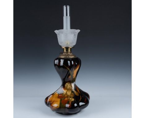 Splendid Aurelian Weller oil lamp style with standard brown glaze in a twisted bulbous form where floral decorations adorn th