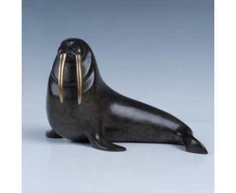 Titled Walrus, this small limited edition sculpture is crafted in patinated and polished bronze with polished brass tucks. Si
