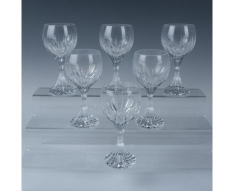 A set of 6 clear stemware, decorated with deep vertical cuts around the bowl, stem, and base. Baccarat marked. This item has 