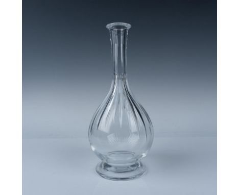 A beautiful clear liquor vessel decorated in a deep vertical cut pattern. Baccarat marked. This item has its original box: 6.