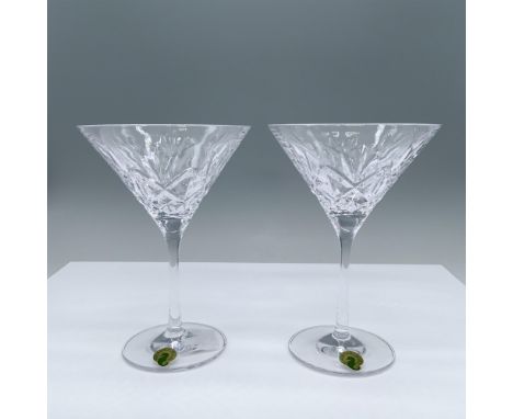 Includes 2 clear glass martini glasses featuring a classical diamond and line pattern. Waterford stickers and marks. This ite