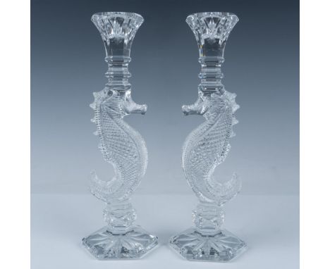 These gorgeous, numbered edition crystal candlesticks are crafted from hand-cut and polished crystal, each featuring an elega