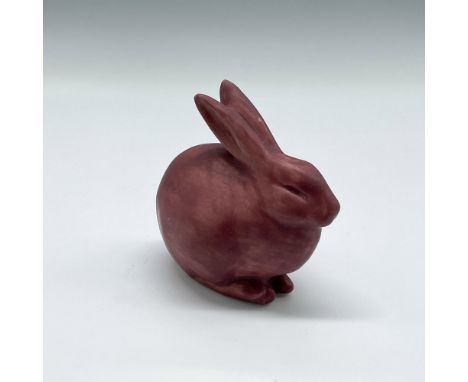 Adorable bunny in crouching position designed from original mold 6160 and finished in burgundy glaze. Rookwood mark. This ite