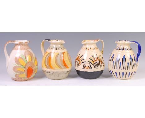 Four Myott & Son Art Deco ceramic water jugs, each with stylised bright coloured floral decoration, incised wavy upper and lo