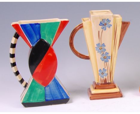 A Myott & Son Art Deco ceramic bowtie jug, painted in bright coloured blocks and stripes, printed backstamp verso, h.20.5cm; 