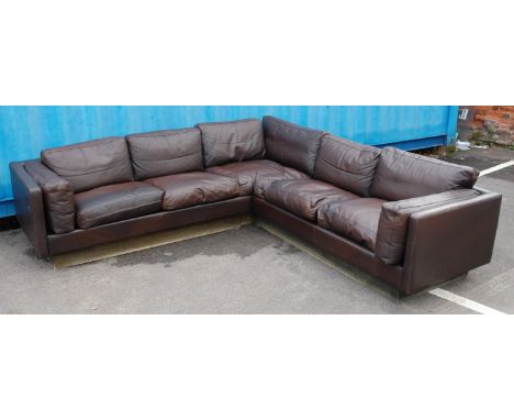 A Danish chocolate brown leather corner sofa by Thams, comprised of three sections with multiple cushions, 250 x 250cm 