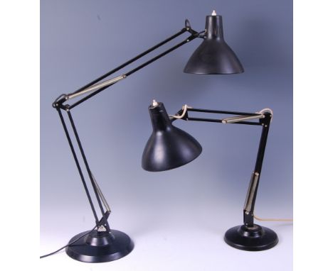 A contemporary black painted anglepoise desk lamp by 1001 Lamps of London, having typical hinged adjustable rotating action, 