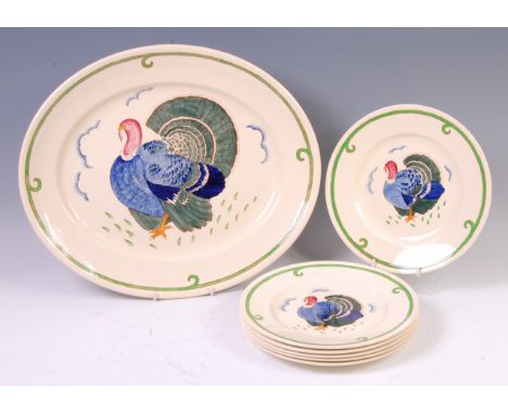 A Burleighware ceramic oval meat plate, designed by Harold Bennett, painted with central turkey, printed backstamp verso, w.4