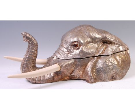 A contemporary silver plated novelty telephone, in the form of an elephant's head, having raised trunk, the hinged cover encl