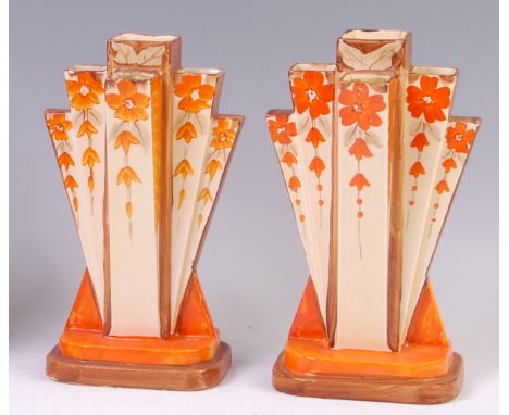 A pair of Myott & Son Art Deco ceramic fan vases, each of square stepped form, painted in tones of orange and brown, printed 