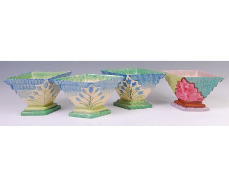 A set of three Myott & Son Art Deco ceramic lozenge shaped posy vases, each of stepped form, bright colour floral decorated, 