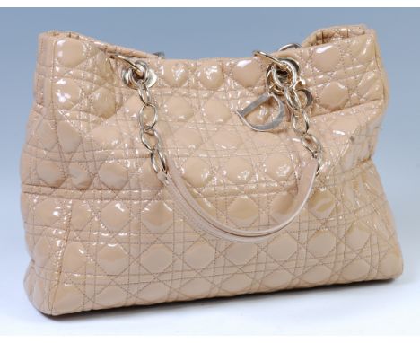 A Christian Dior beige quilted lambskin leather soft shopping tote bag, having gilt metal hardware, with two partially ringed
