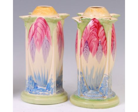 A pair of Myott & Son Art Deco ceramic torpedo vases, each having bright colour floral decoration and printed backstamps vers