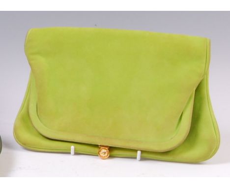 A vintage Gianni Versace lime green fabric clutch bag, having embossed gilt metal clasp and interior label, w.24cm, with dust