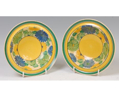 Two 1930s Clarice Cliff Sungay pattern soup bowls, each of circular form with bright coloured decoration, printed backstamps 