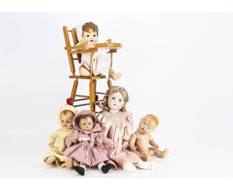 Various dolls, a reproduction K*R 117 signed WPM 92,-- 27in. (69cm.)high, two composition babies, one by Petite Doll, an Feff