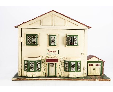A wooden dolls' house Rosemary Villa 1952, cream painted with tinplate windows and doors, garage and red painted roof, front 