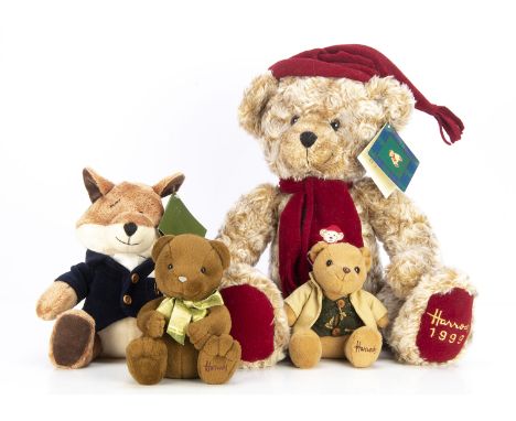 Four Harrods Teddy bears, including  a 1999 Christmas teddy bear, with red hat and scarf, with card tag --15½in (39.5cm) high