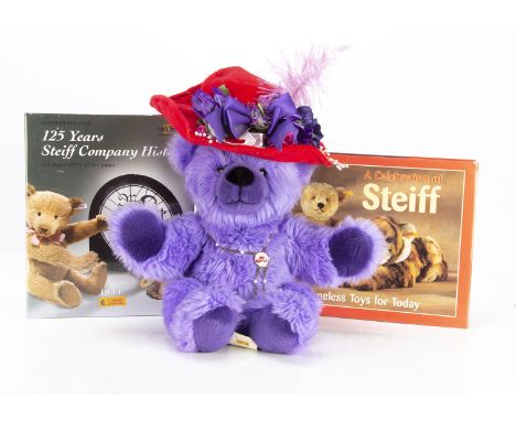 A  Steiff yellow tagged Red Hat Society teddy bear,  with original drawstring bag; A Celebration of Steiff,  Timeless Toys fo