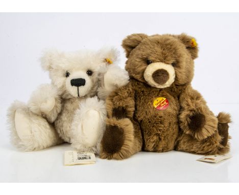 Two Steiff yellow tag teddy bears, one white and one light brown, soft stuffed and unjointed -- 10½in (27cm) high