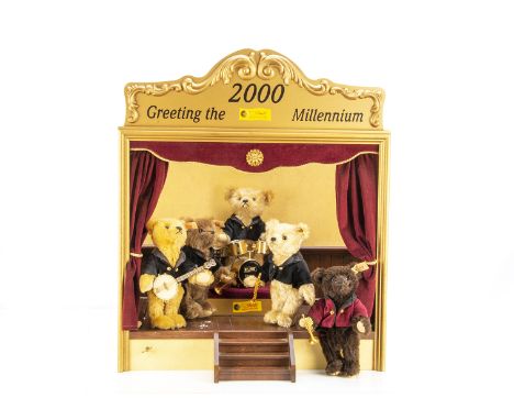 A Steiff limited edition  Millennium Band, 1699 of 2000, with 5 Teddy bear musicians, on a wooden stage with velvet curtain, 