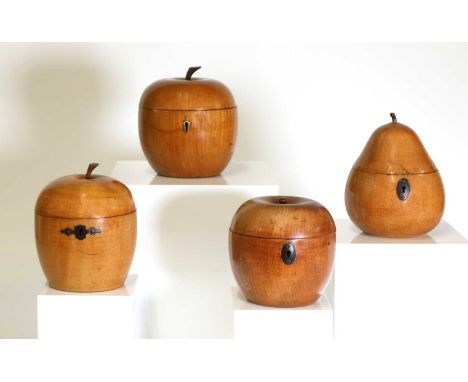Four George III fruitwood tea caddies,each fitted with a hinged cover, stalk finial and escutcheon, three modelled as apples 