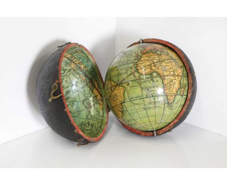 A George III 3-inch pocket globe,early 19th century, inscribed 'West, Bazaar, Soho Square London J. Mynde Sc.' in a circular 