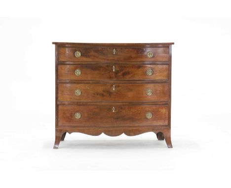 A George III mahogany chest of drawers,late 18th century, of bow-fronted outline with four drawers, raised on bracket feet,89