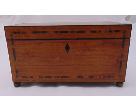 A Victorian rectangular tea caddy with hinged cover revealing fitted interior on four ball feet, 17 x 31 x 16.5cm