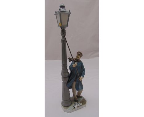 Lladro figurine of a lamplighter lighting a street lamp, marks to the base, 47cm (h)