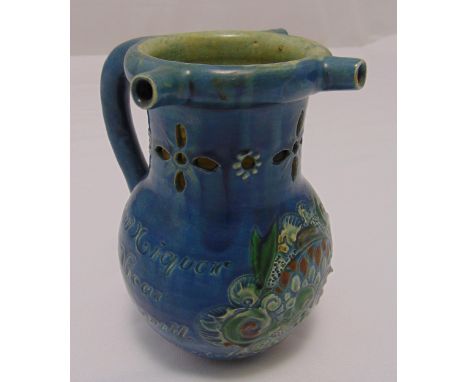 A Victorian salt glazed ceramic puzzle jug decorated with flowers, leaves and inscription, signed and dated to the base, 16.c