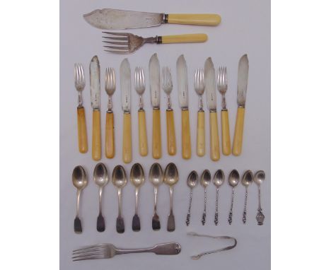 A quantity of hallmarked silver flatware to include spoons, fish eaters and servers
