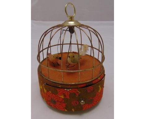 A musical jewellery box in the form of an automaton with two birds in a cage, 25cm (h)