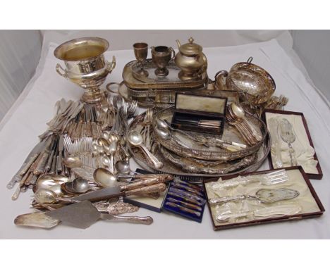 A quantity of silver plate to include trays, a champagne bucket and flatware