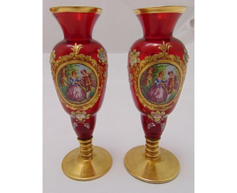 A pair of ruby glass vases, baluster form decorated with courting scenes on raised circular bases, 16cm (h)