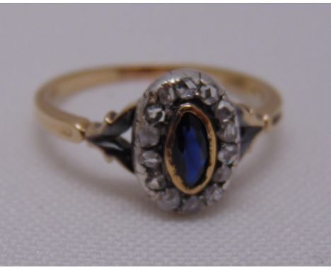 An antique 9ct gold, sapphire and rose cut diamonds dress ring with silver mount, approx total weight 2.6g