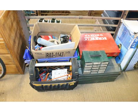 A large quantity of tools to include a Stanley tool bag and contents of caulk guns; a box containing various oils; an air com