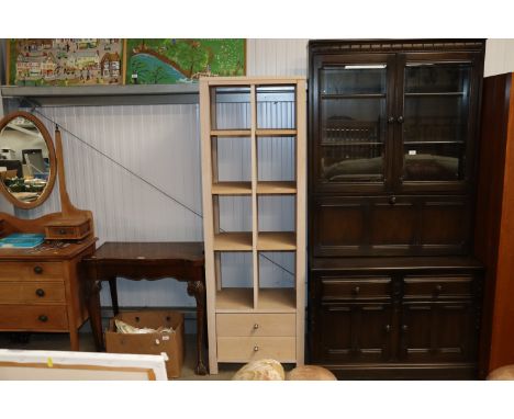 A contemporary limed oak effect shelf unit