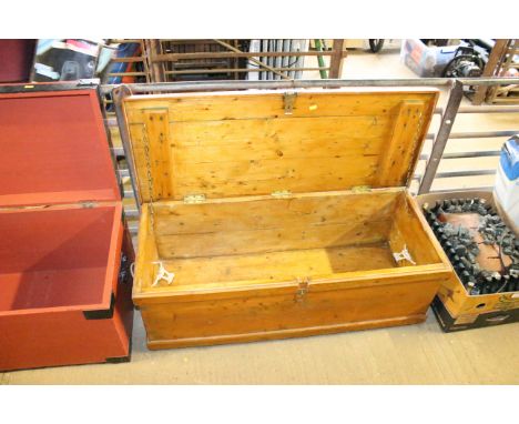 A wooden storage trunk