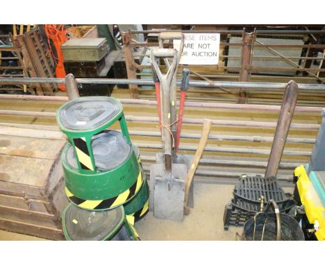 A quantity of garden tools to include spades, fork, axe, shears etc.