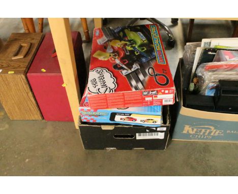Three micro Scalextric sets, plus track
