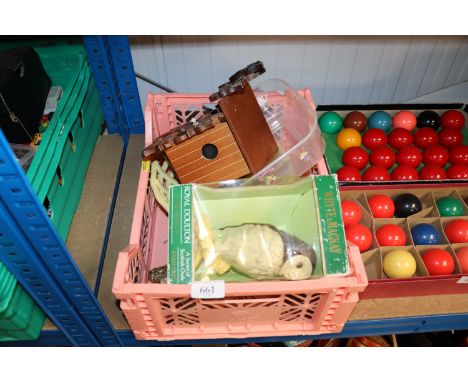 A plastic tray containing a white Royal Doulton barn owl decanter; a cuckoo clock; dressing table hand mirror; paper knives e